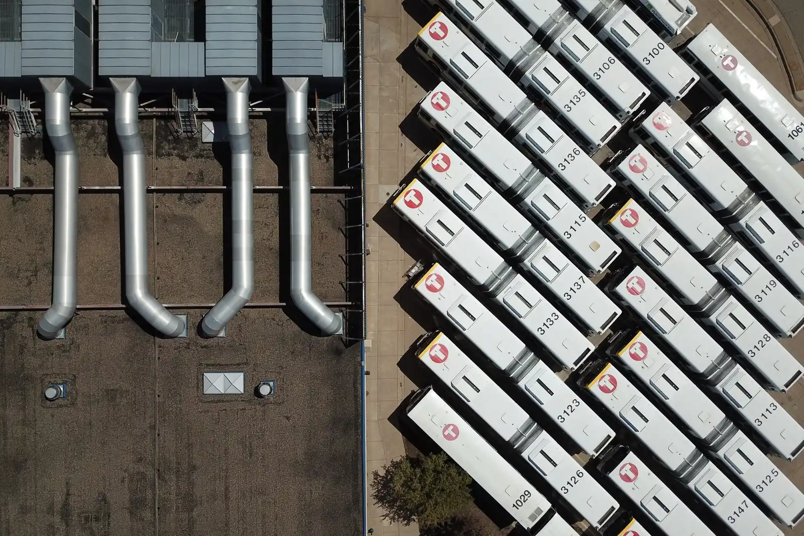 Aerial view of a commercial rooftop with HVAC equipment